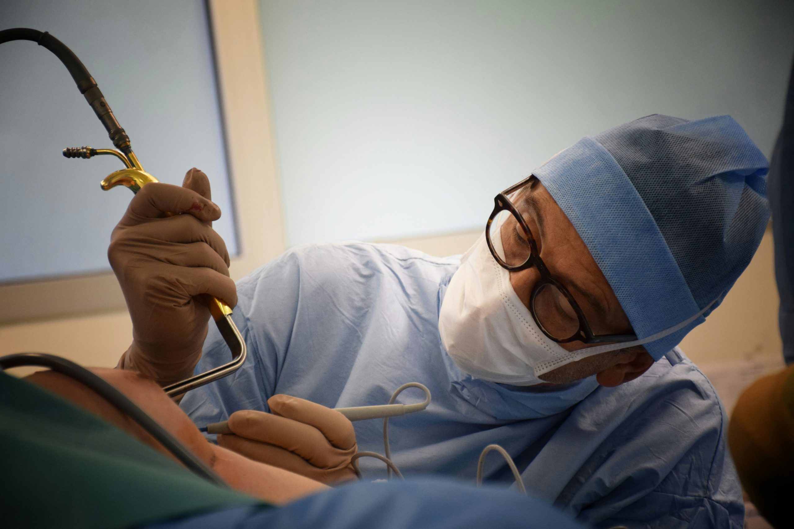 Effectiveness and safety of saline or silicone gel filled breast implants in women undergoing revision-augmentation